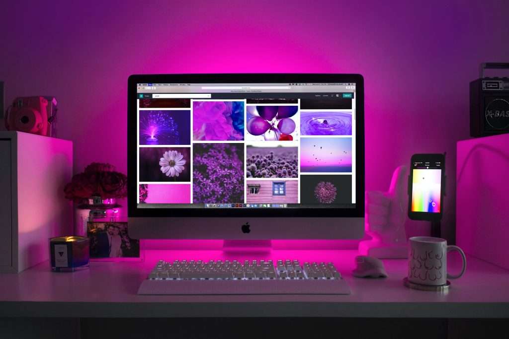 computer which have some pink lights